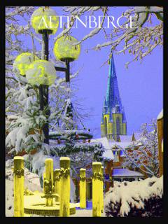 Winterimpression Altenberge, ein Blick vom Marktplatz mit Brunnen auf die Pfarrkirche St. Johannes Baptist